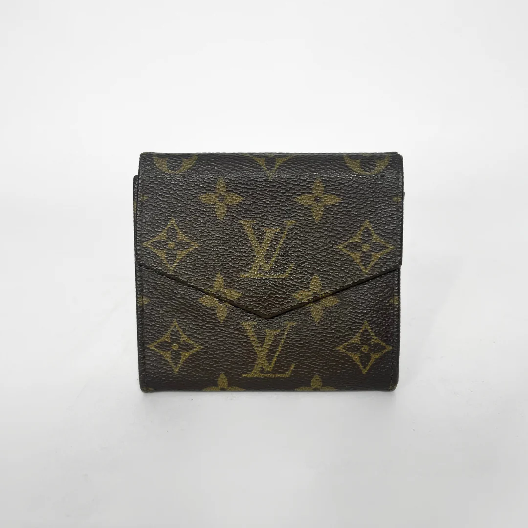 Louis Vuitton wallet with monogram pattern on a white background