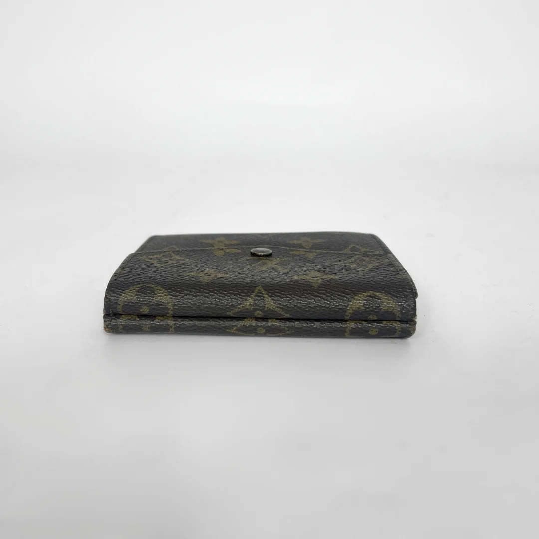 Black wallet with yellow monogram pattern on a white background