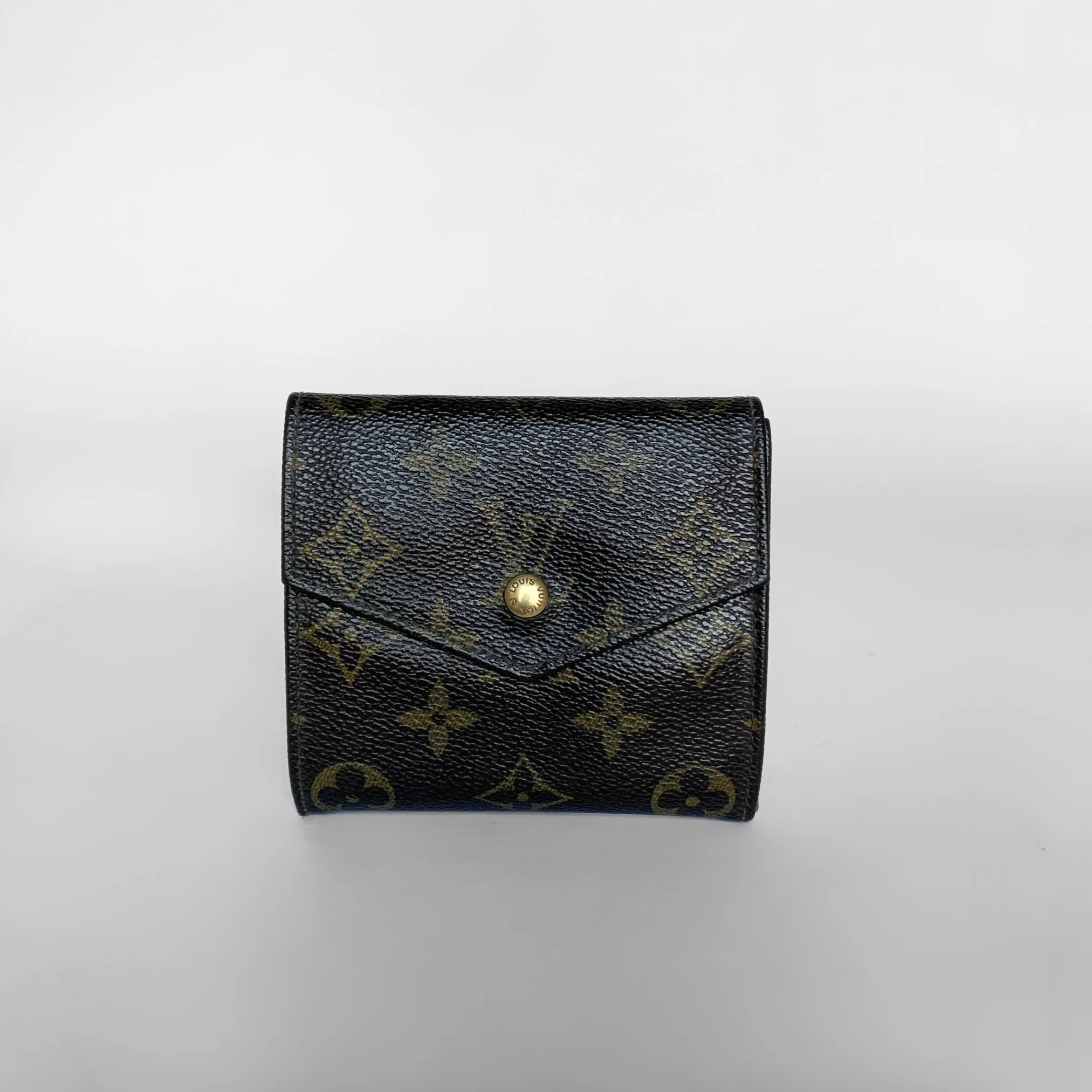Folded wallet with a distinctive pattern on a light gray background