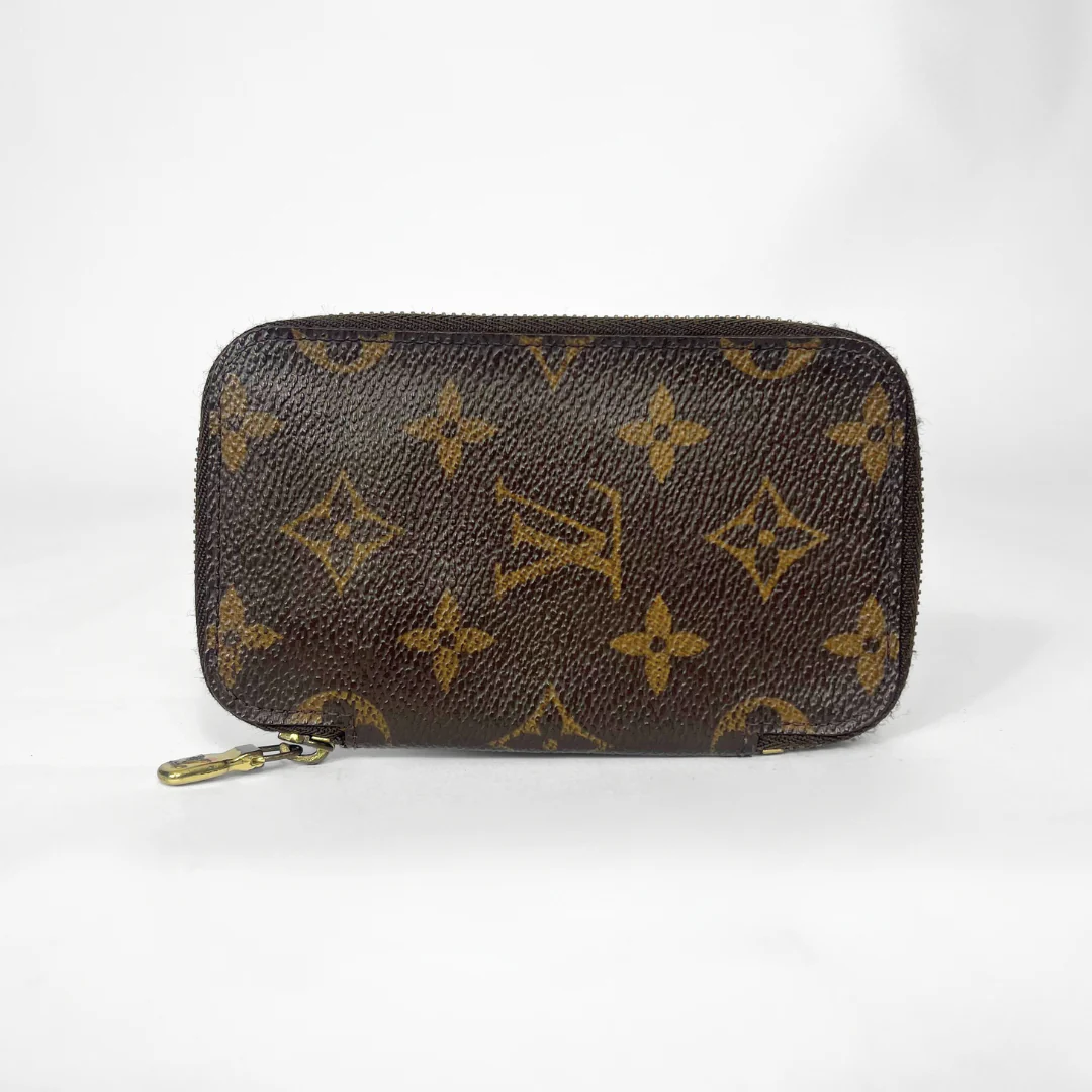 Brown monogram patterned wallet on a white background