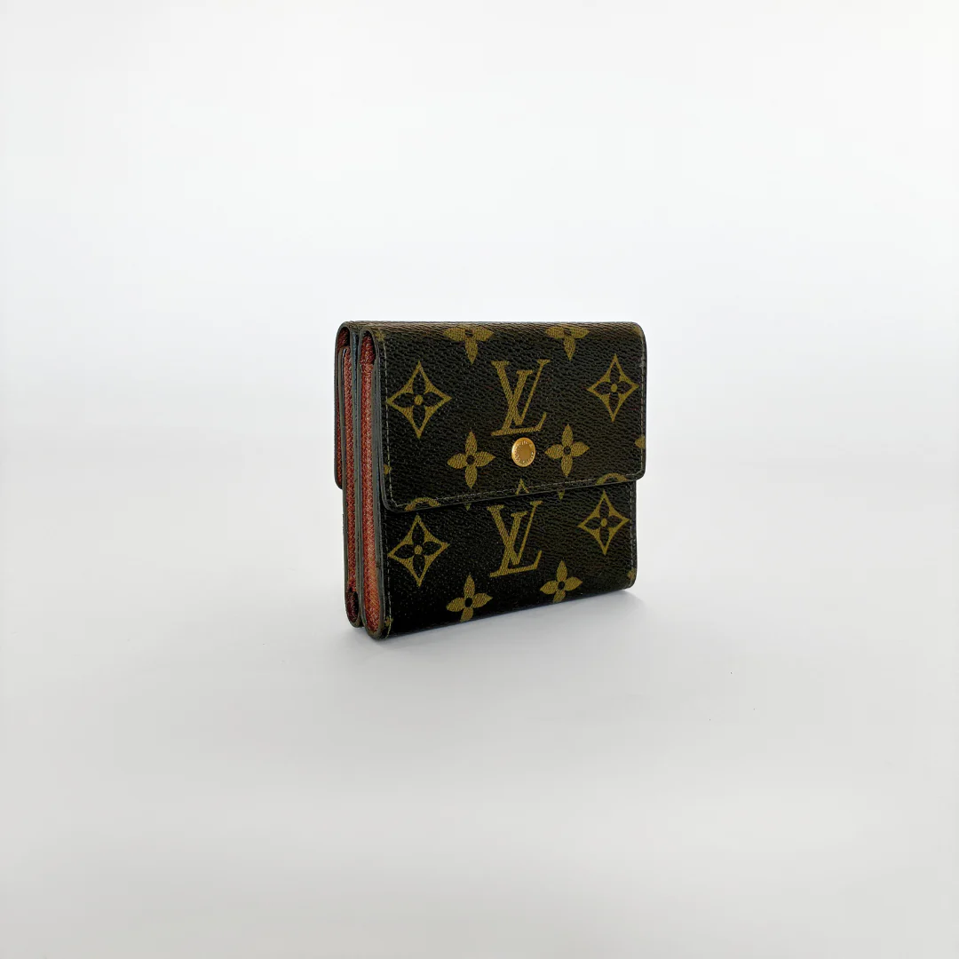 Louis Vuitton wallet with monogram pattern on a white background