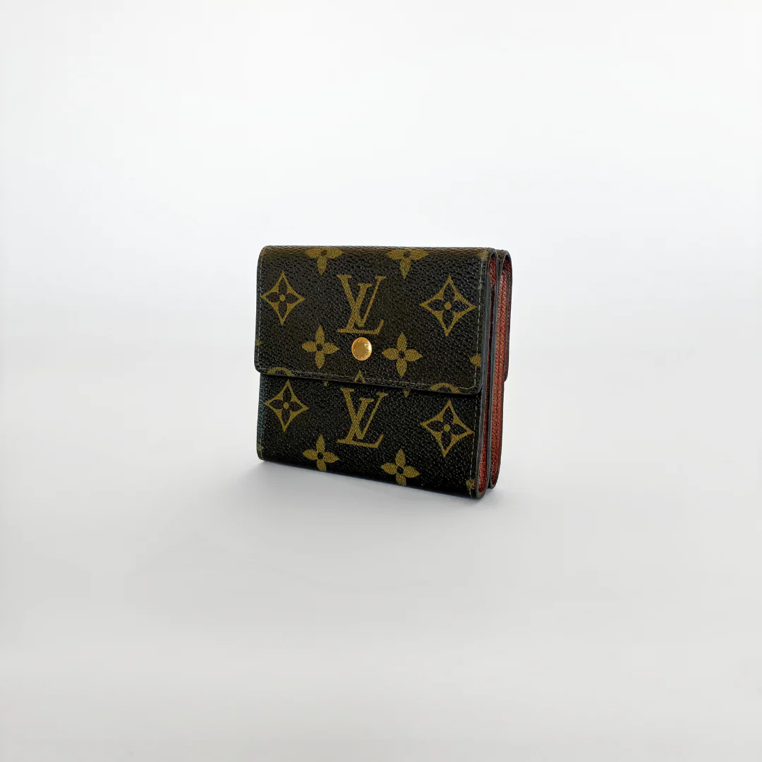 Louis Vuitton wallet with monogram pattern on a white background