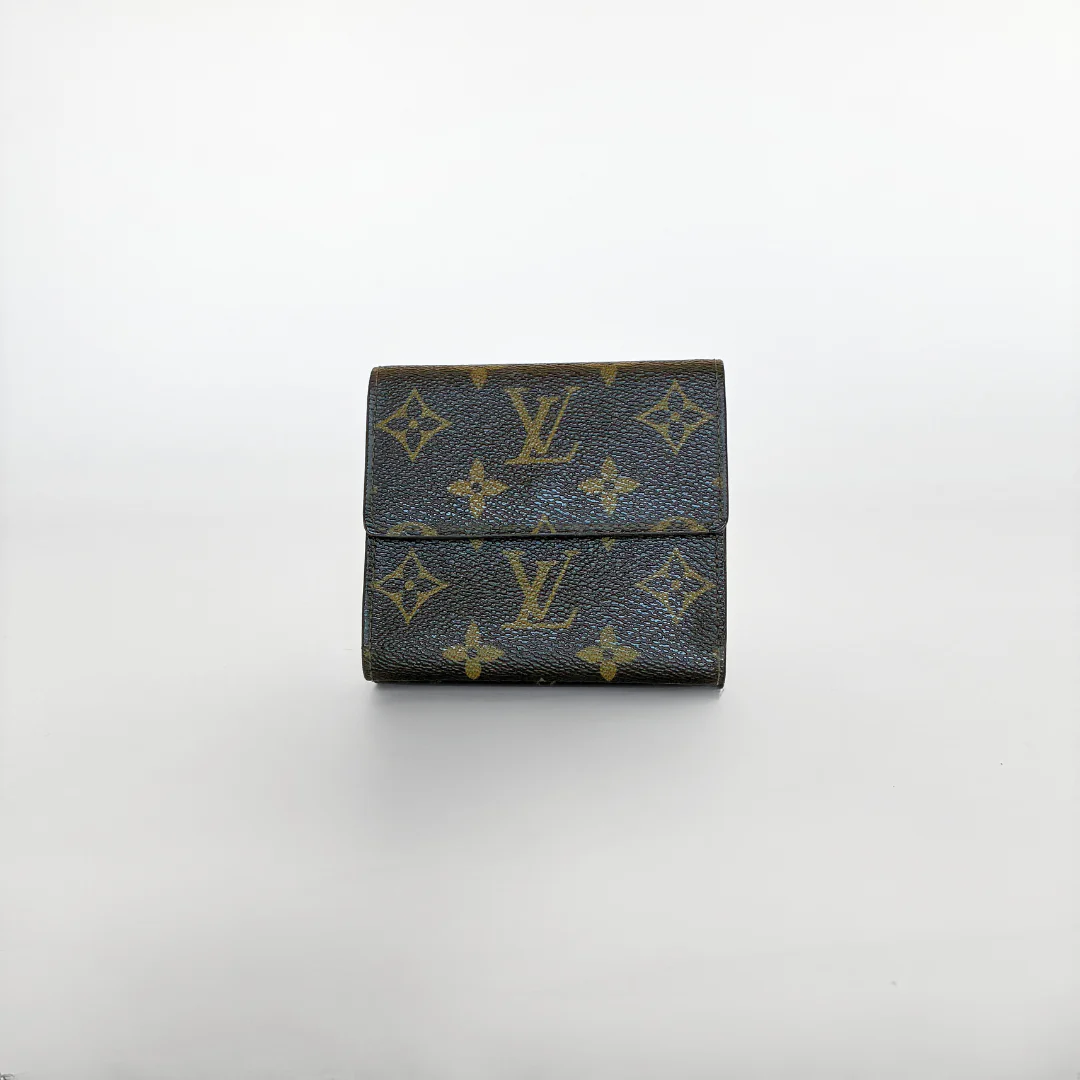 Louis Vuitton wallet with monogram pattern on a white background