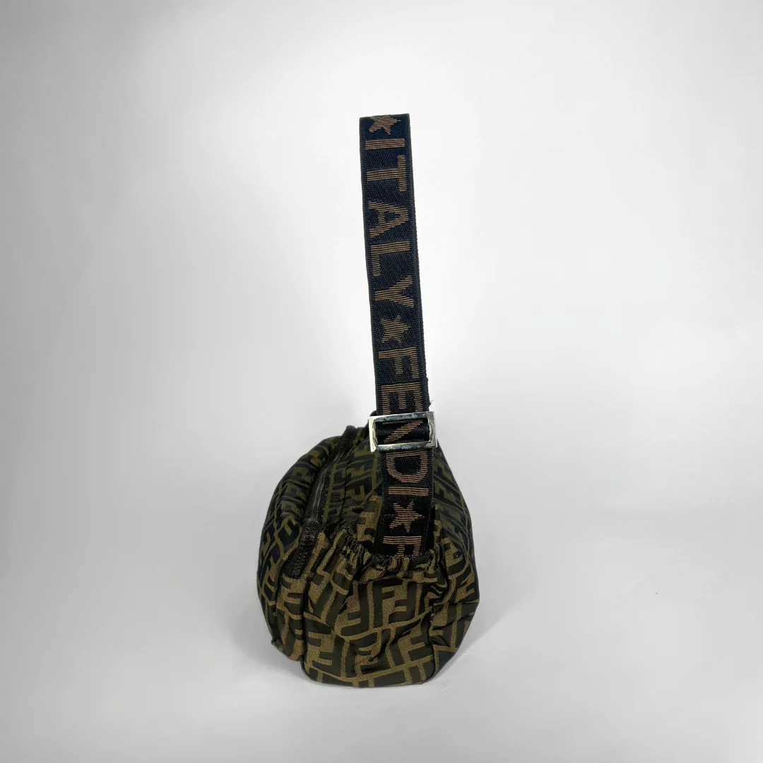 Patterned bag with a strap on a white background