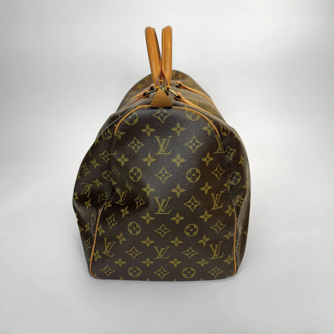 Louis Vuitton monogram bag on a light gray background