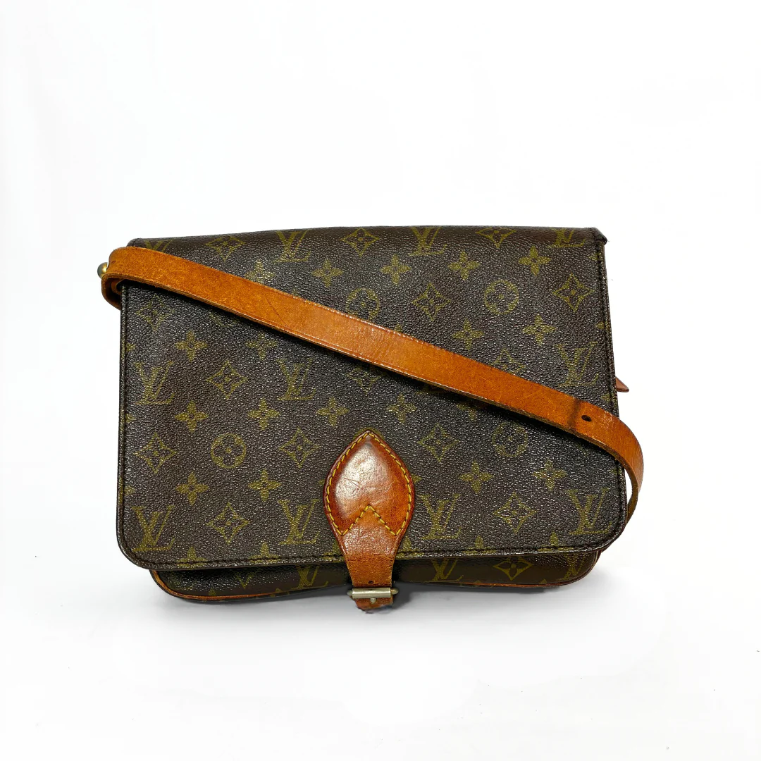 Louis Vuitton Cartouchière GM Monogram Canvas on a white background