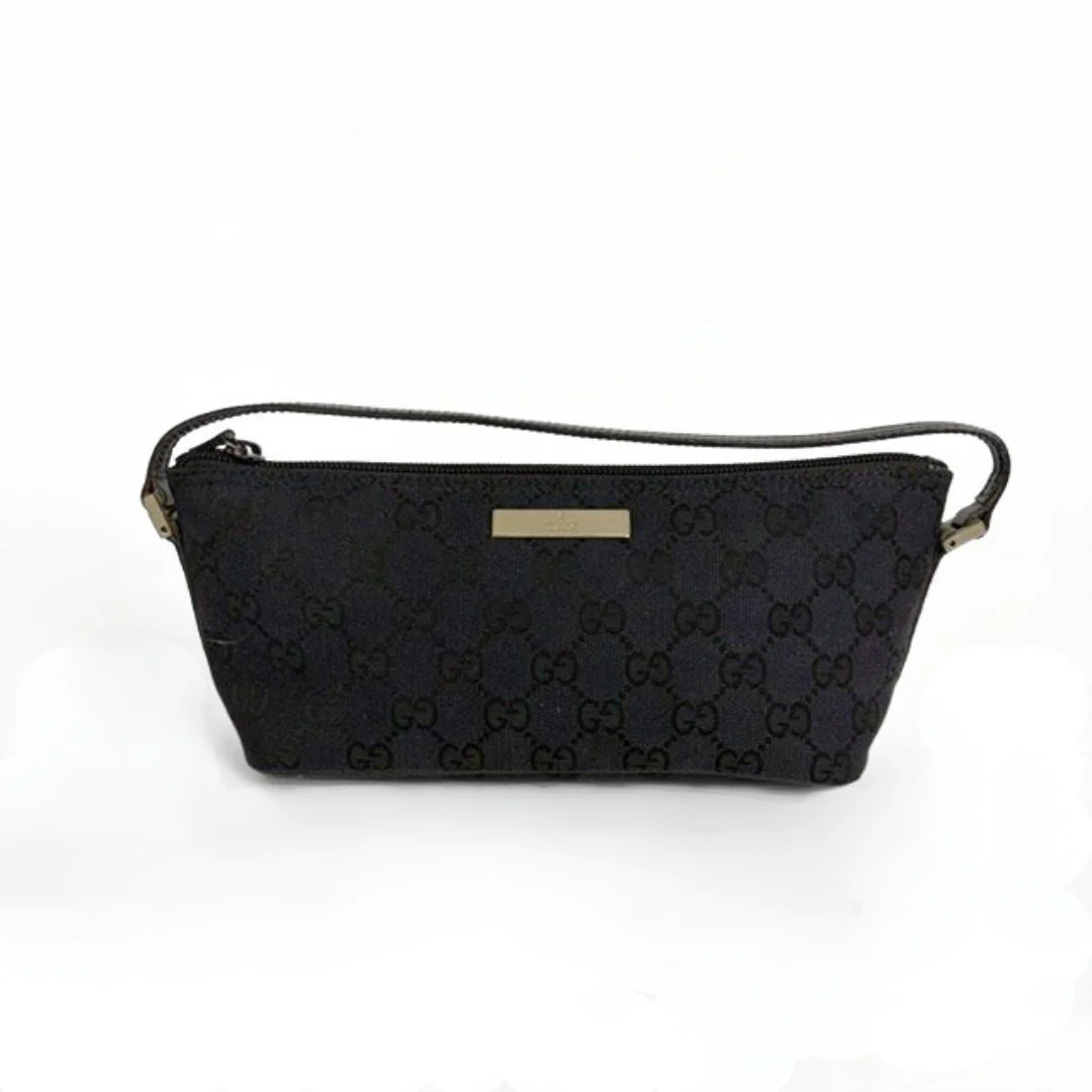Gucci Boat Pochette in Canvas with the classic Gucci print on a white background