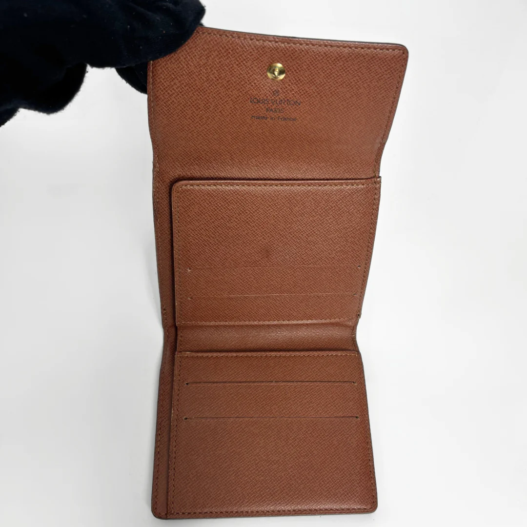 Brown leather wallet on a white background