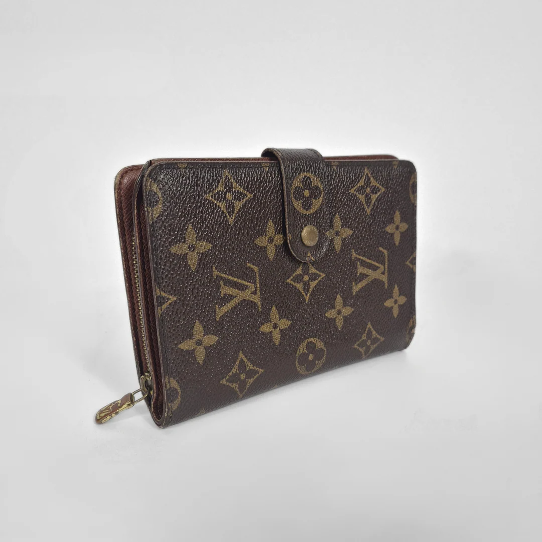 Brown wallet with monogram pattern on a white background