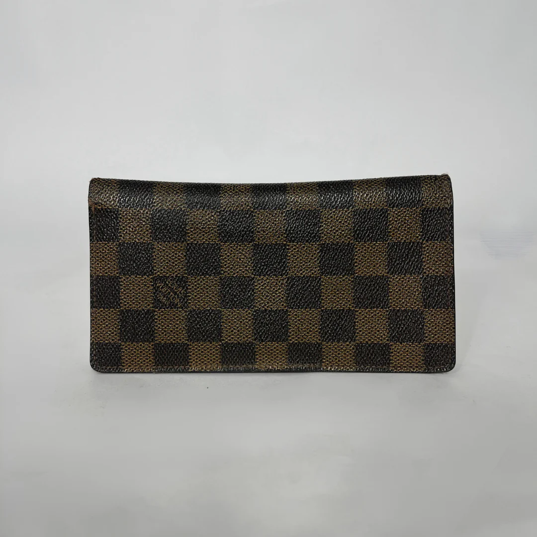 Brown checkered wallet on a white background