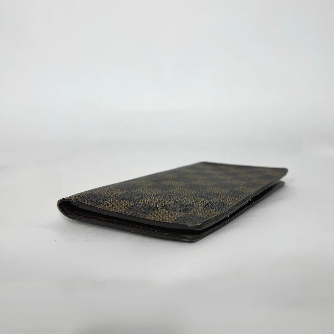 Checkered wallet on a light gray background