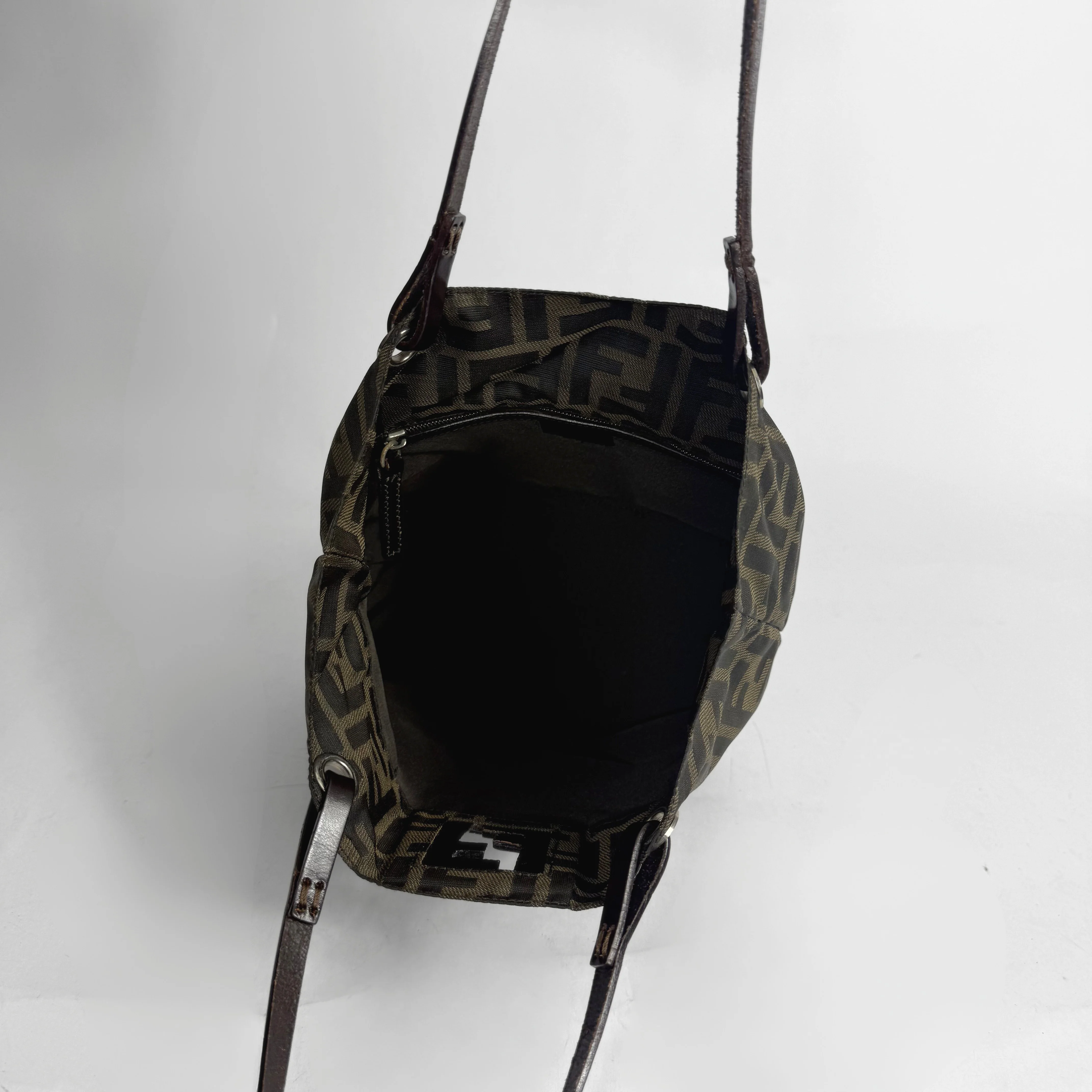 Black and patterned bag on a white background