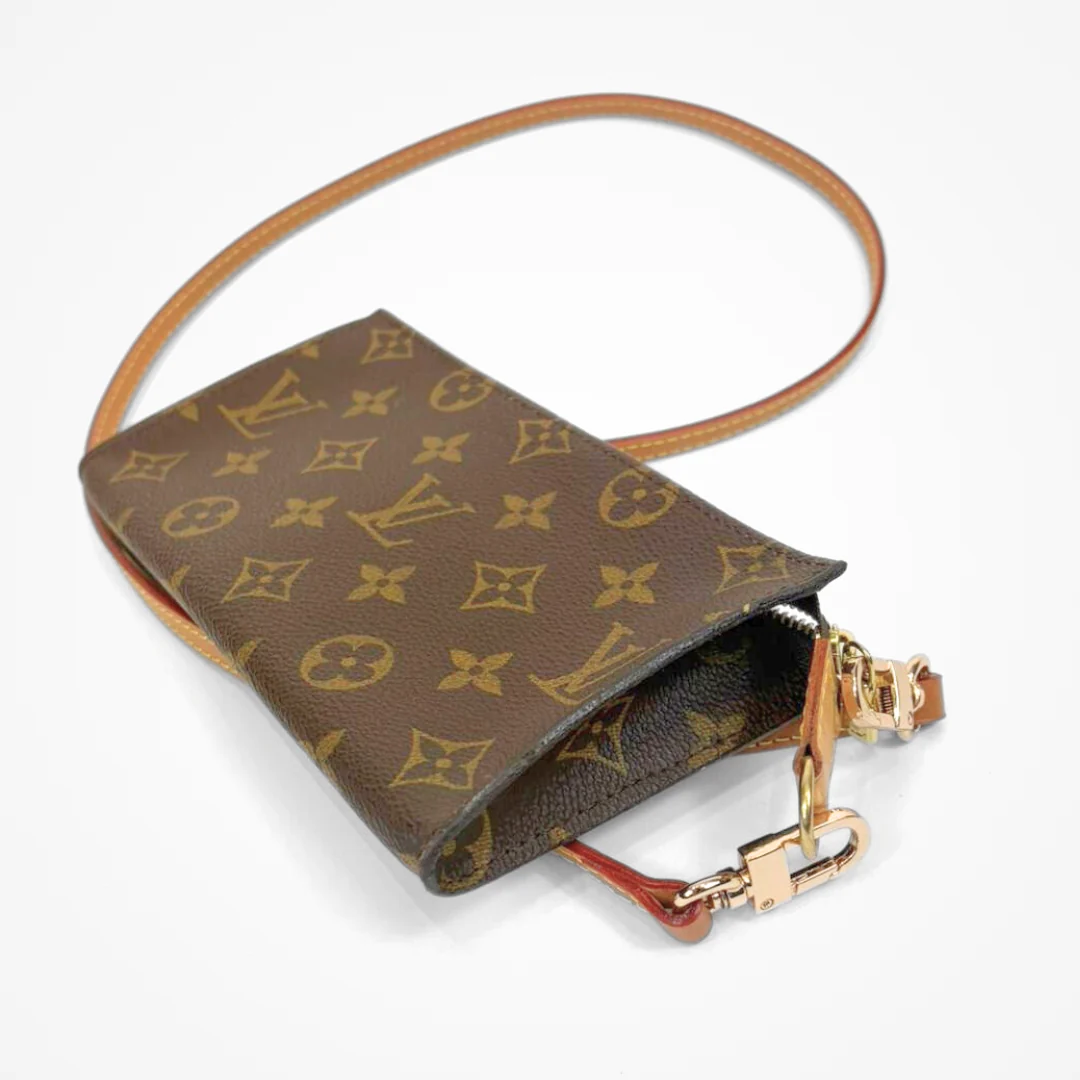 LV pouch with monogram pattern on a white background