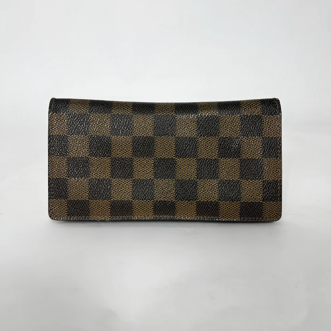 Checkered wallet with brown and black pattern on a white background