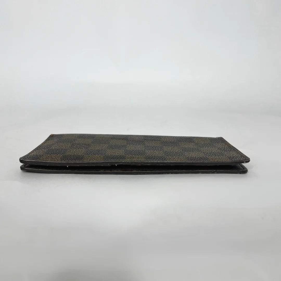 Folded fabric with a checkered pattern on a white background