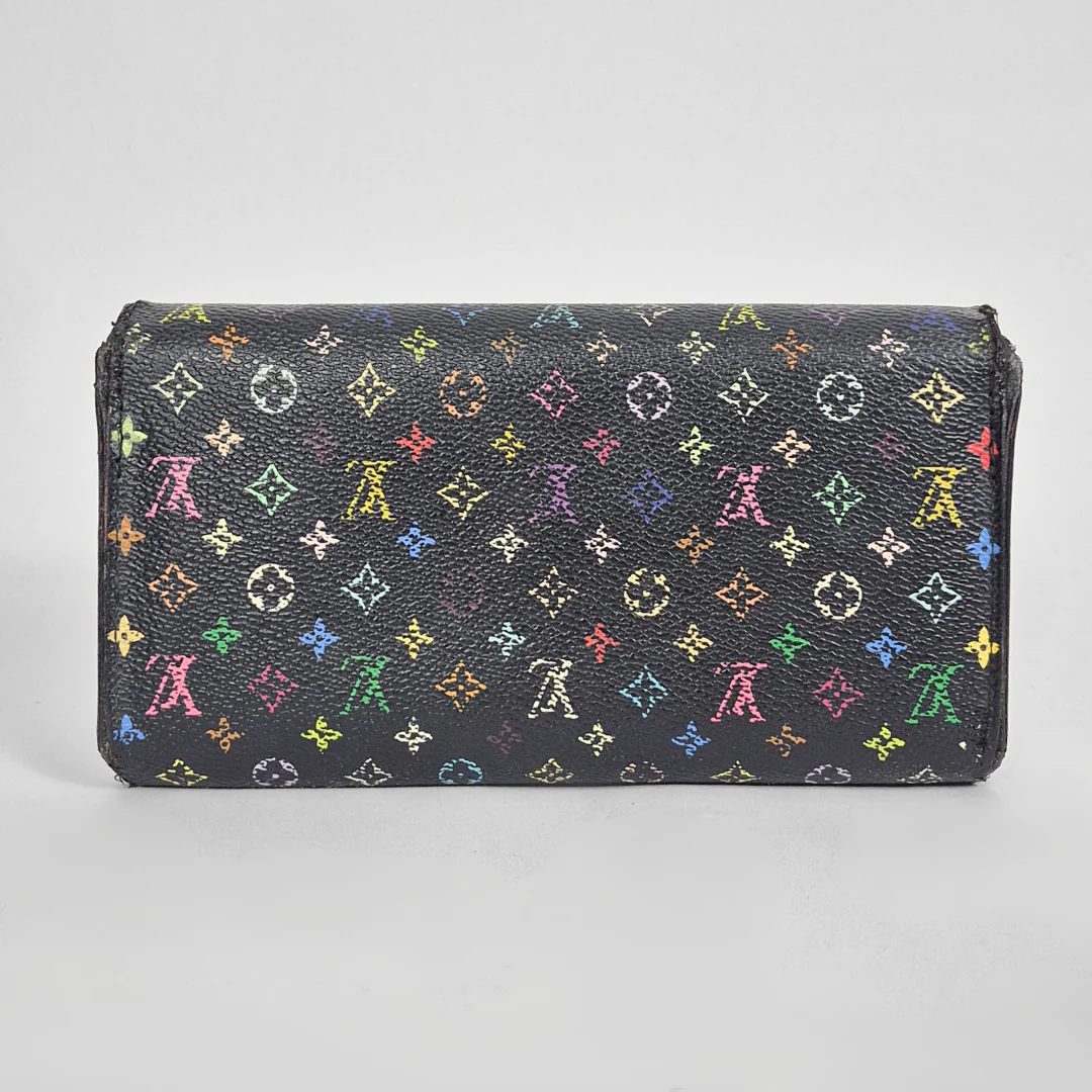 Multicolored patterned wallet on a light gray background
