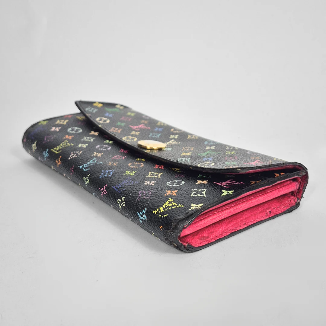 Designer wallet with colorful pattern on a gray background