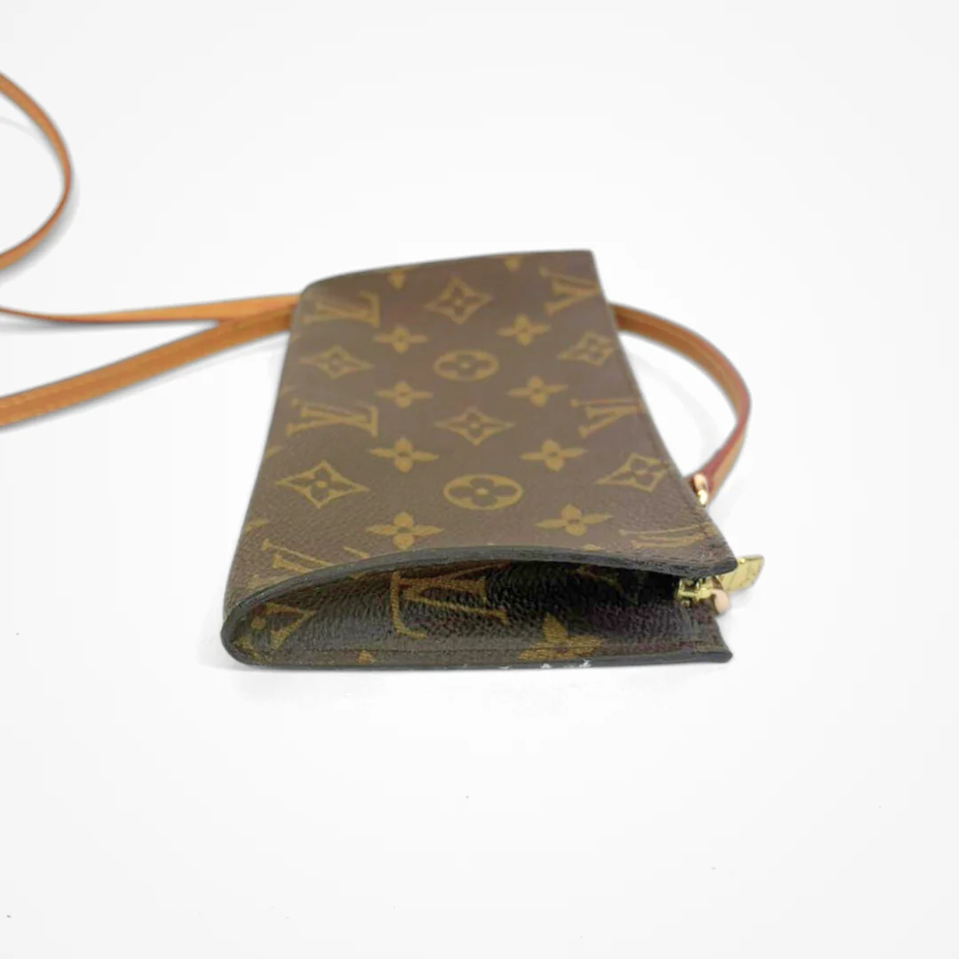 LV pouch with monogram pattern on a white background