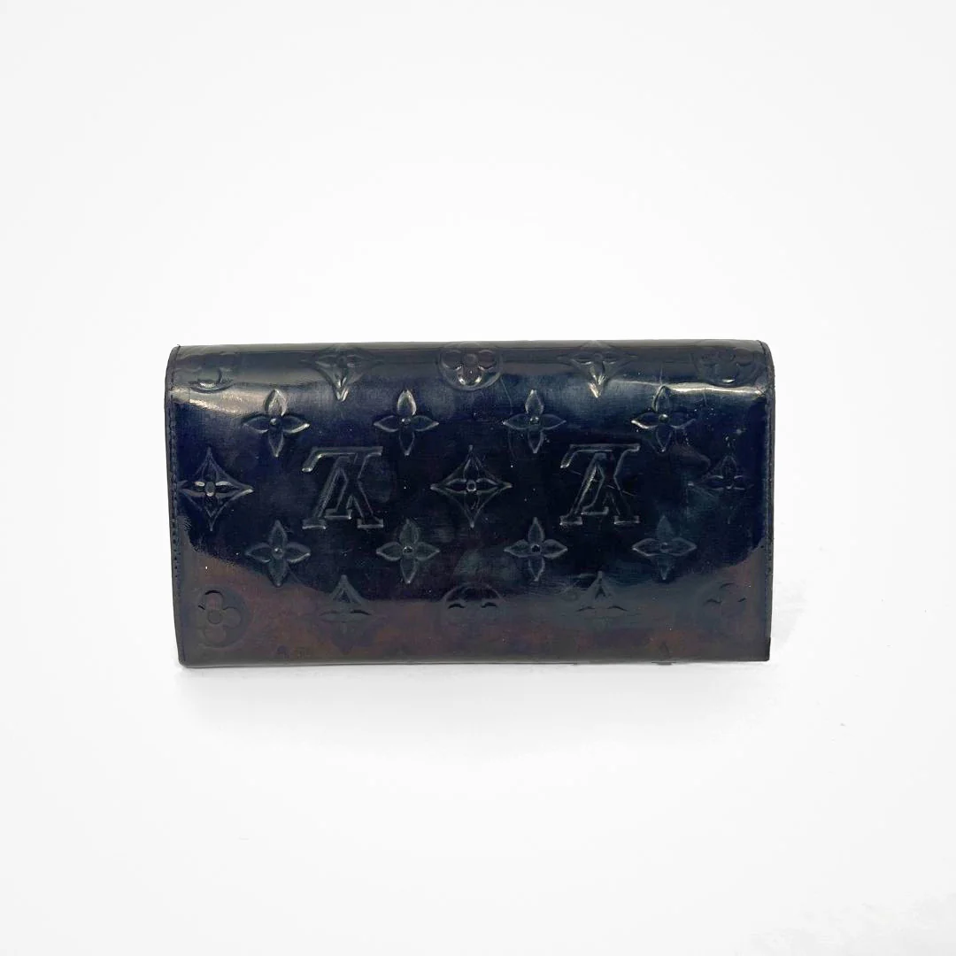 Louis Vuitton Vernis Wallet on a white background