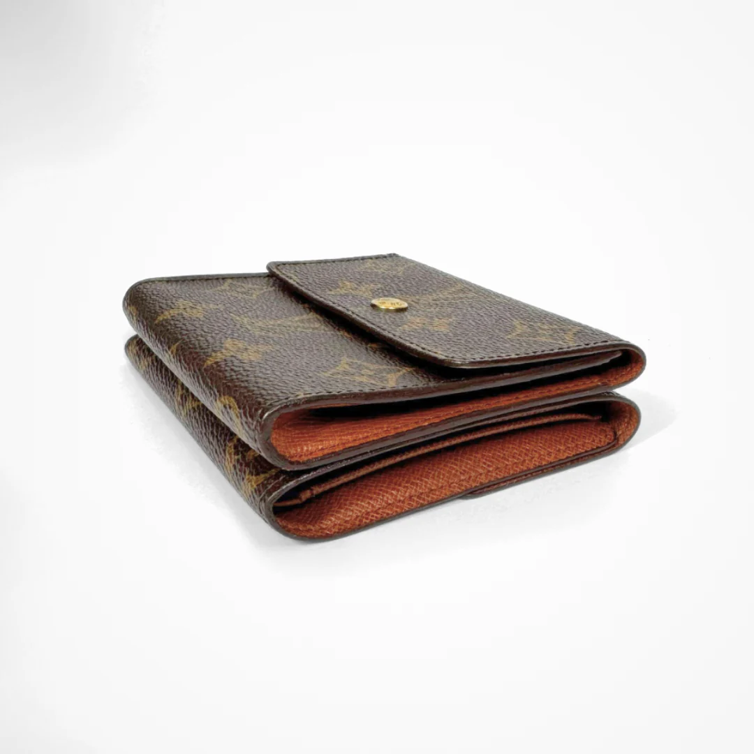 Louis Vuitton Druk Wallet on a white background