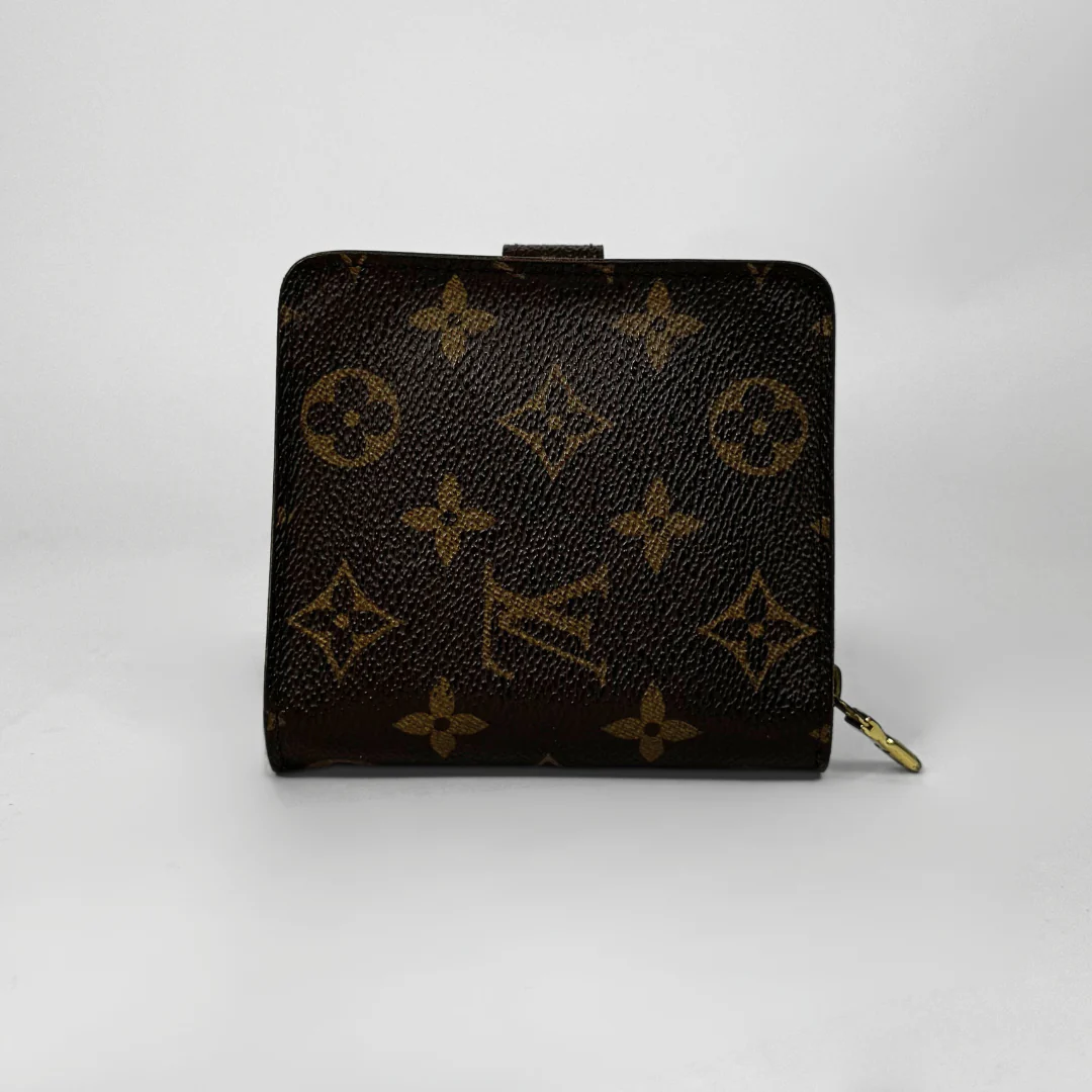Designer wallet with monogram pattern on a white background