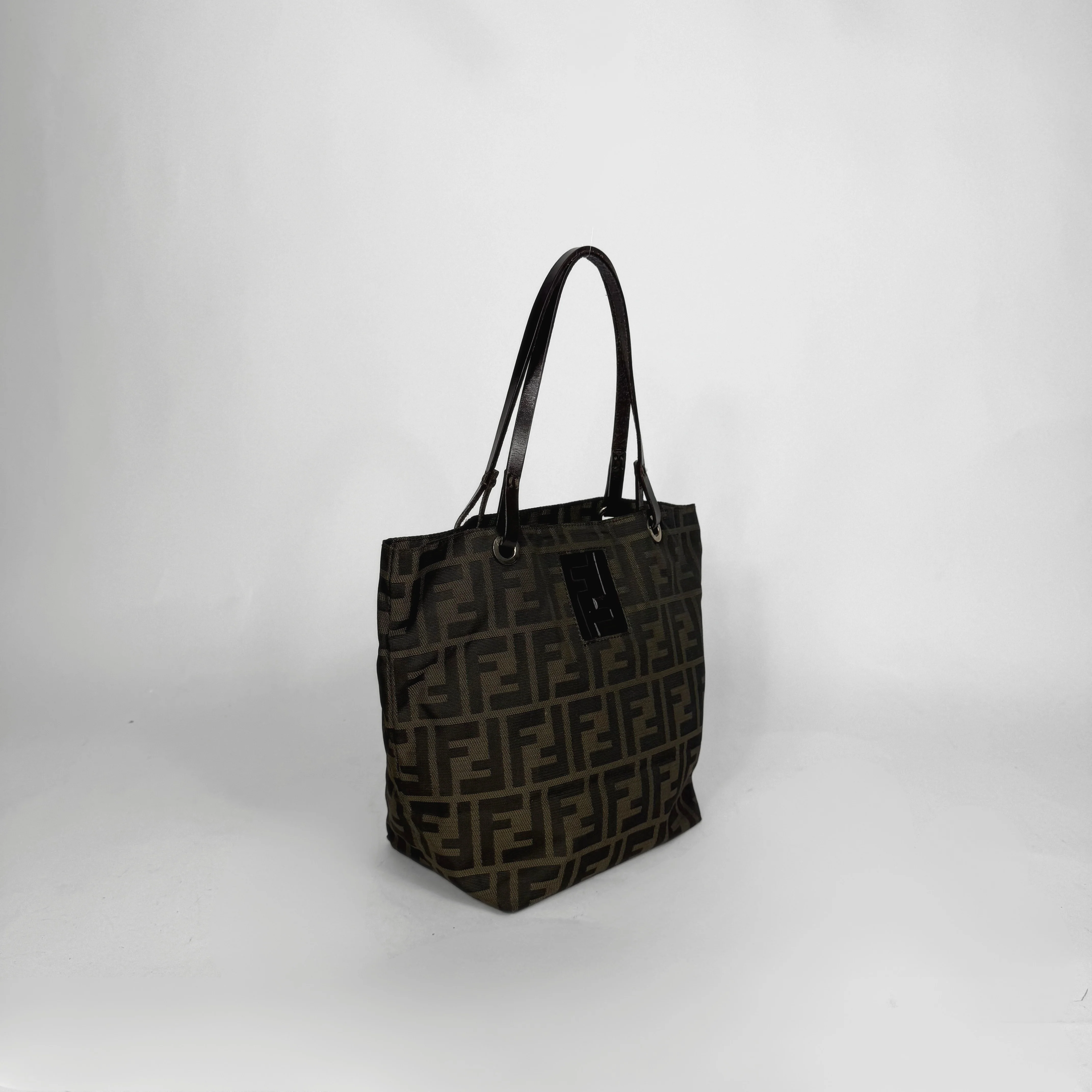 Black patterned tote bag on a white background