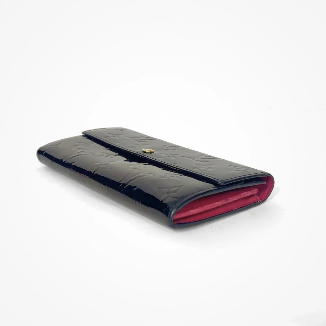 Louis Vuitton Vernis Wallet on a white background
