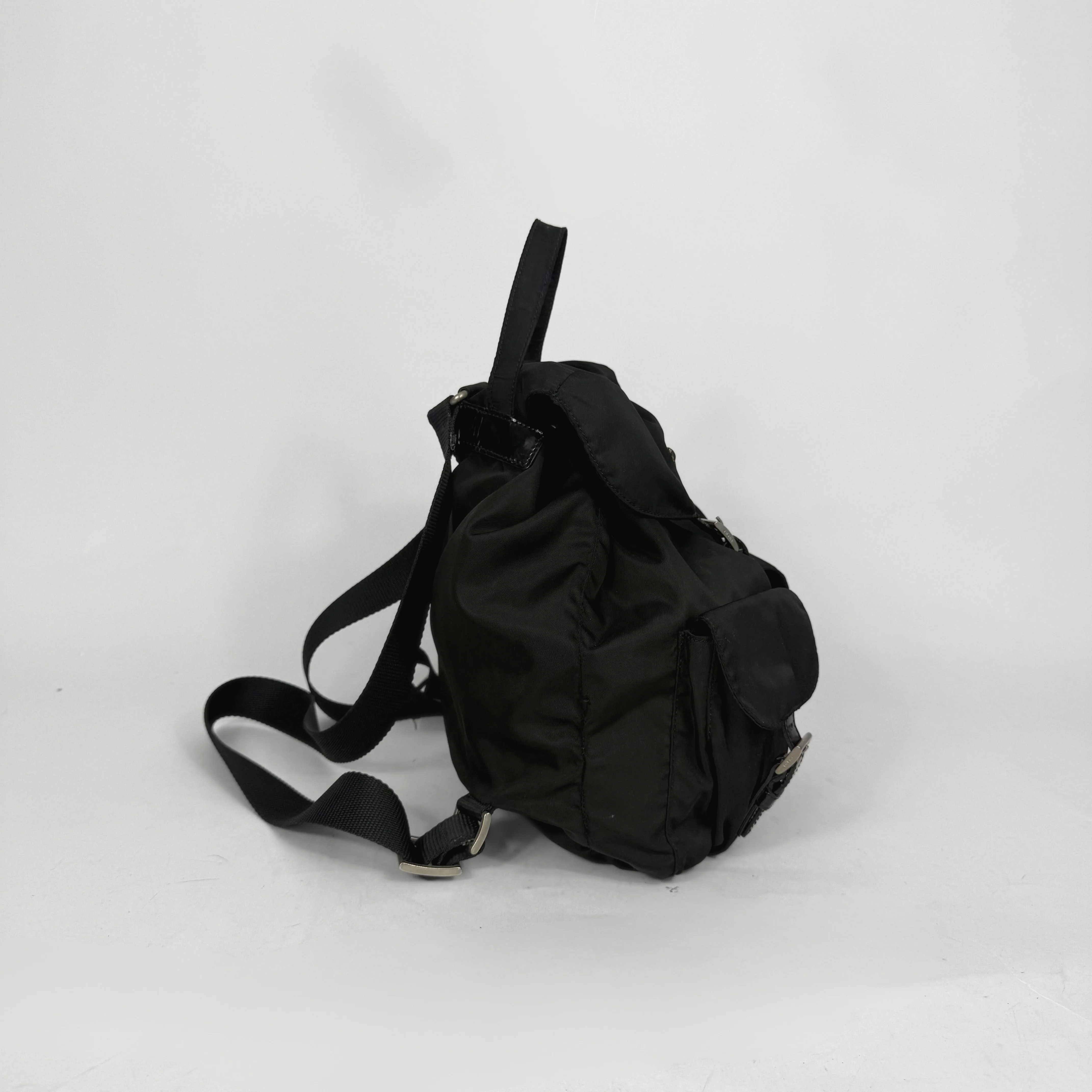 Black backpack on a white background