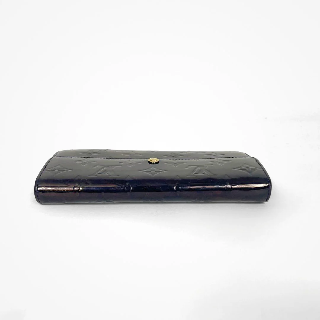 Louis Vuitton Vernis Wallet on a white background